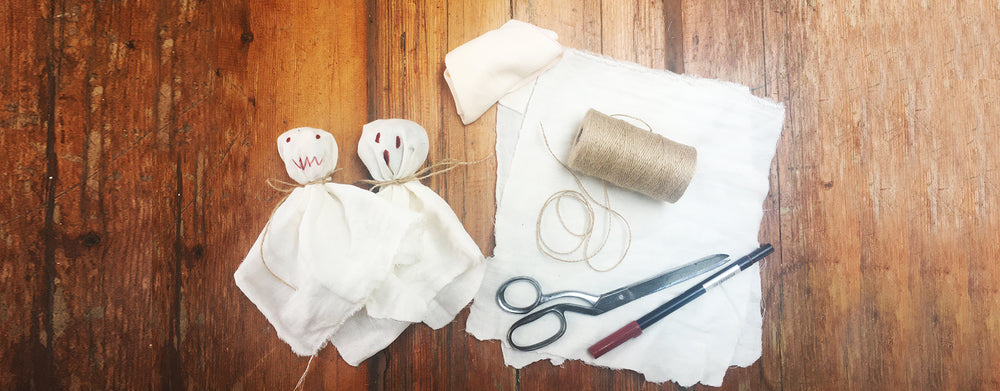 Let's get crafty! Make your own Halloween eco ghost garland.