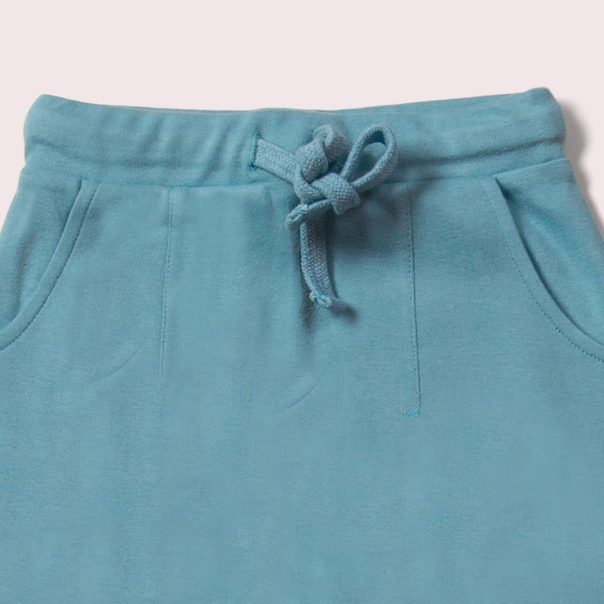 Little-Green-Radicals-Blue-Knee-Patch-Joggers-With-Star-Print-Closeup-View