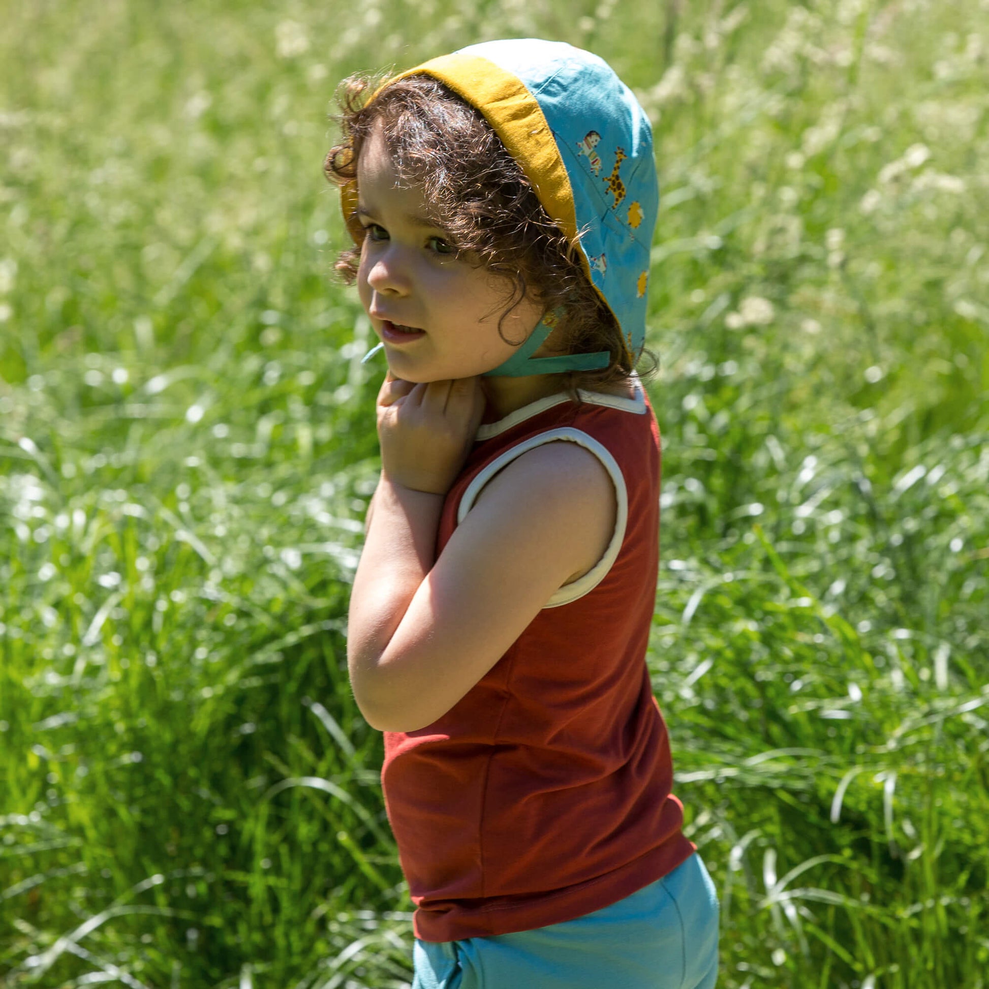 Little-Green-Radicals-Blue-Reversible-Sunhat-With-Giraffe-Horse-Elephant-Print-Kid