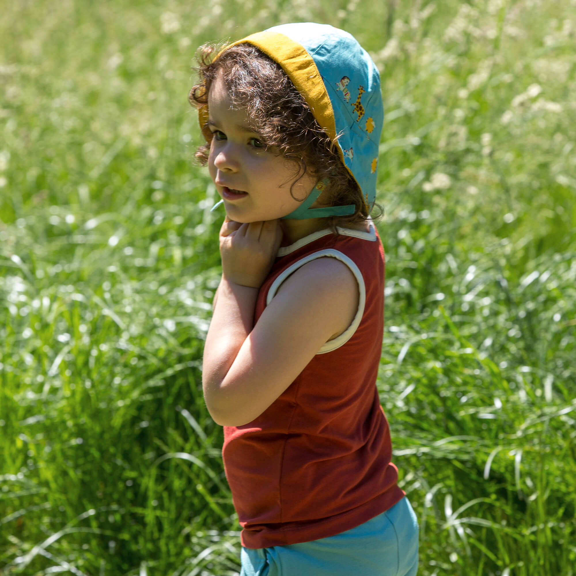 Little-Green-Radicals-Blue-Reversible-Sunhat-With-Giraffe-Horse-Elephant-Print-Kid