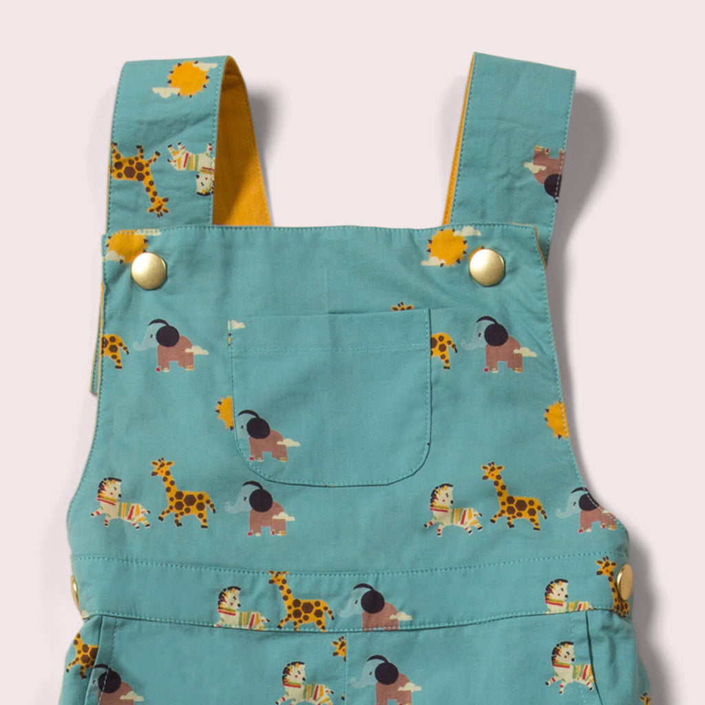 Little-Green-Radicals-Blue-and_Yellow-Shortie-Dungarees-With-Giraffe-Horse-and-Elephant-Print-Closeup
