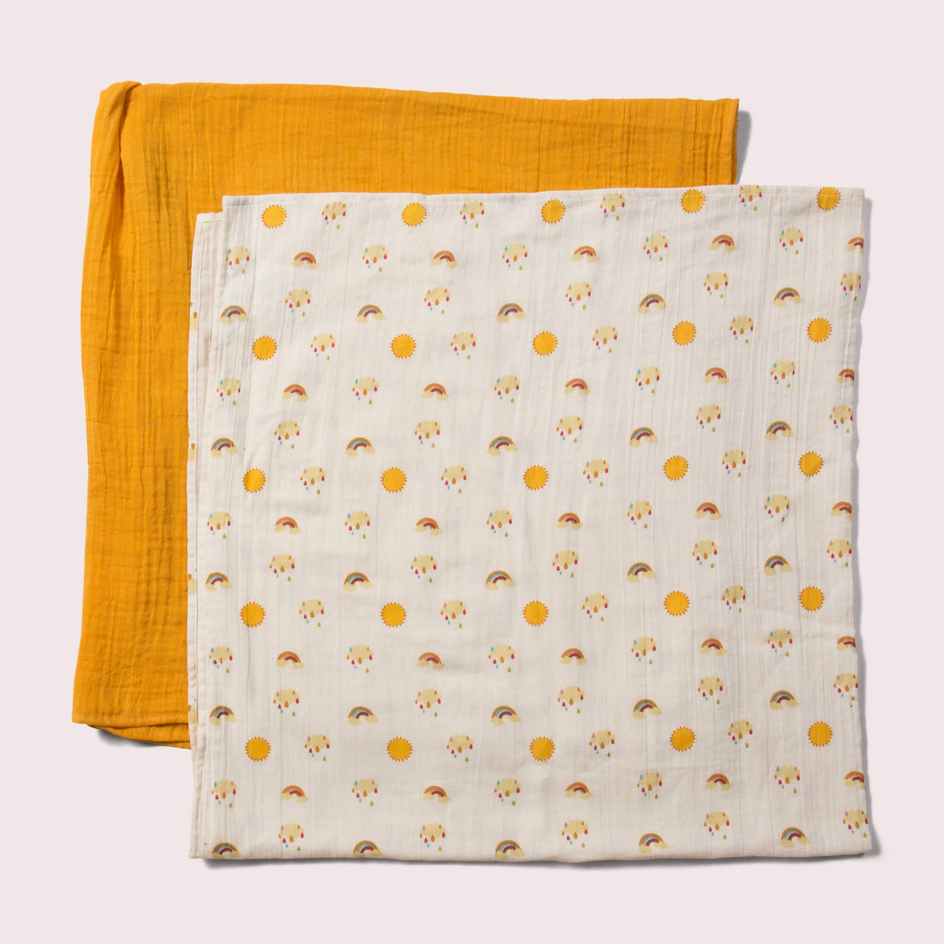 Little-Green-Radicals-Cream-And-Orange-Organic-Baby-Muslin-Set-2-Pack-With-Sunshine-and-Rainbow-Print-Reverse