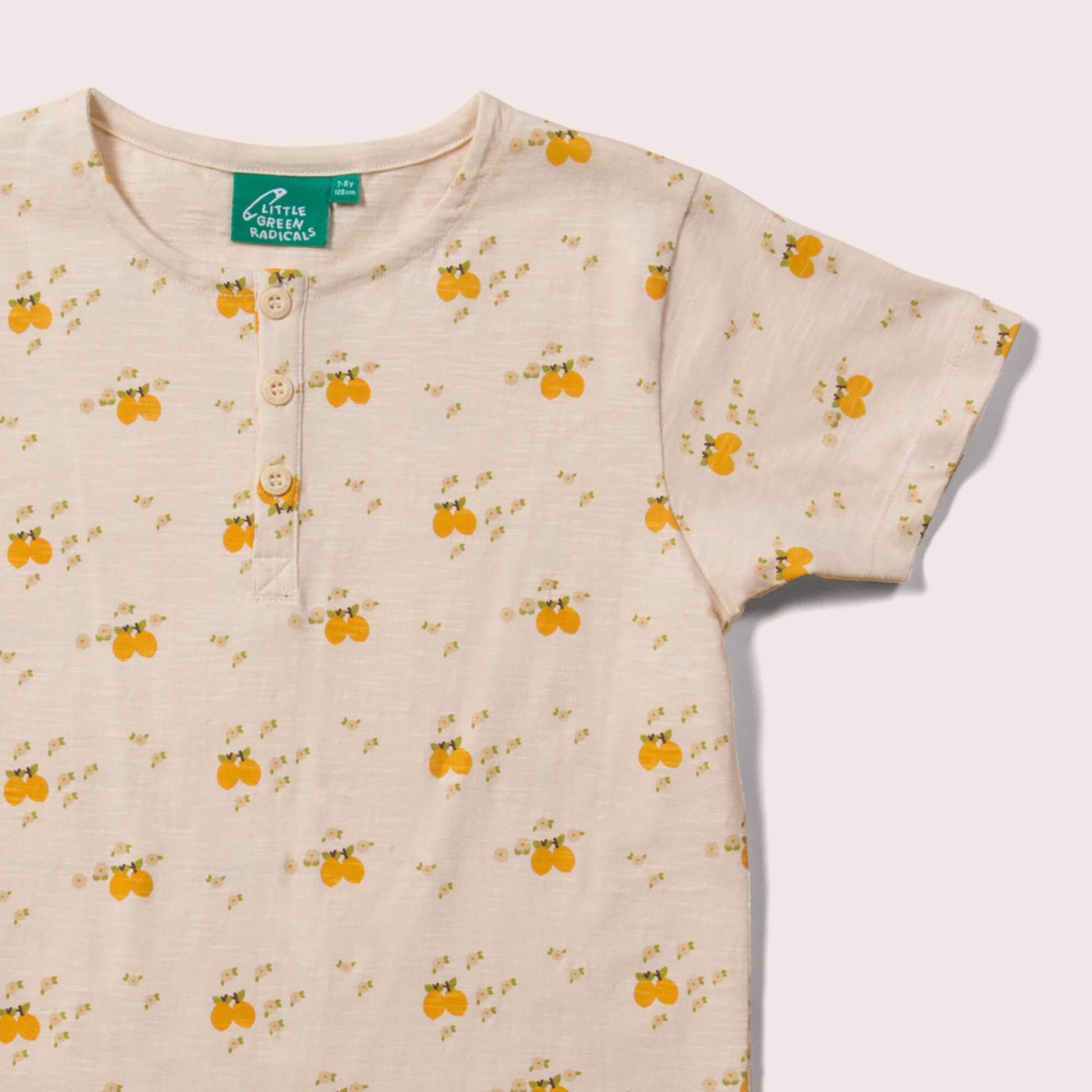 Little-Green-Radicals-Cream-Loose-Short-Sleeve-Top-With-Lemon-Print-Closeup