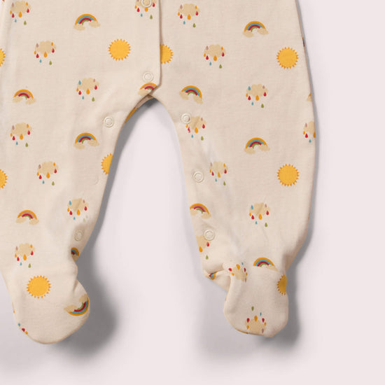 Little-Green-Radicals-Cream-Organic-Babygrow-With-Sun-and-Rainbow-Print-close-up-view