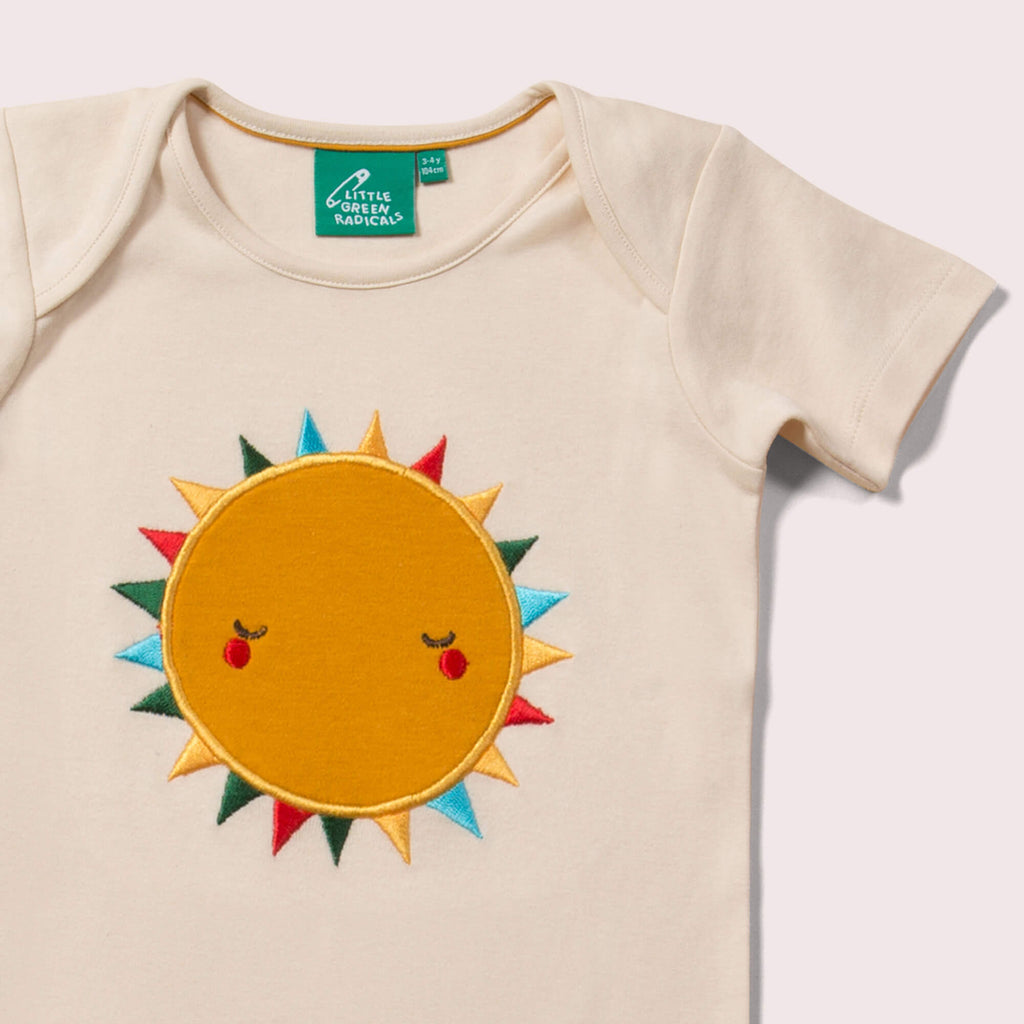 Little-Green-Radicals-Cream-Organic-Short-Sleeve-T-Shirt-With-Sun-Print-Closeup