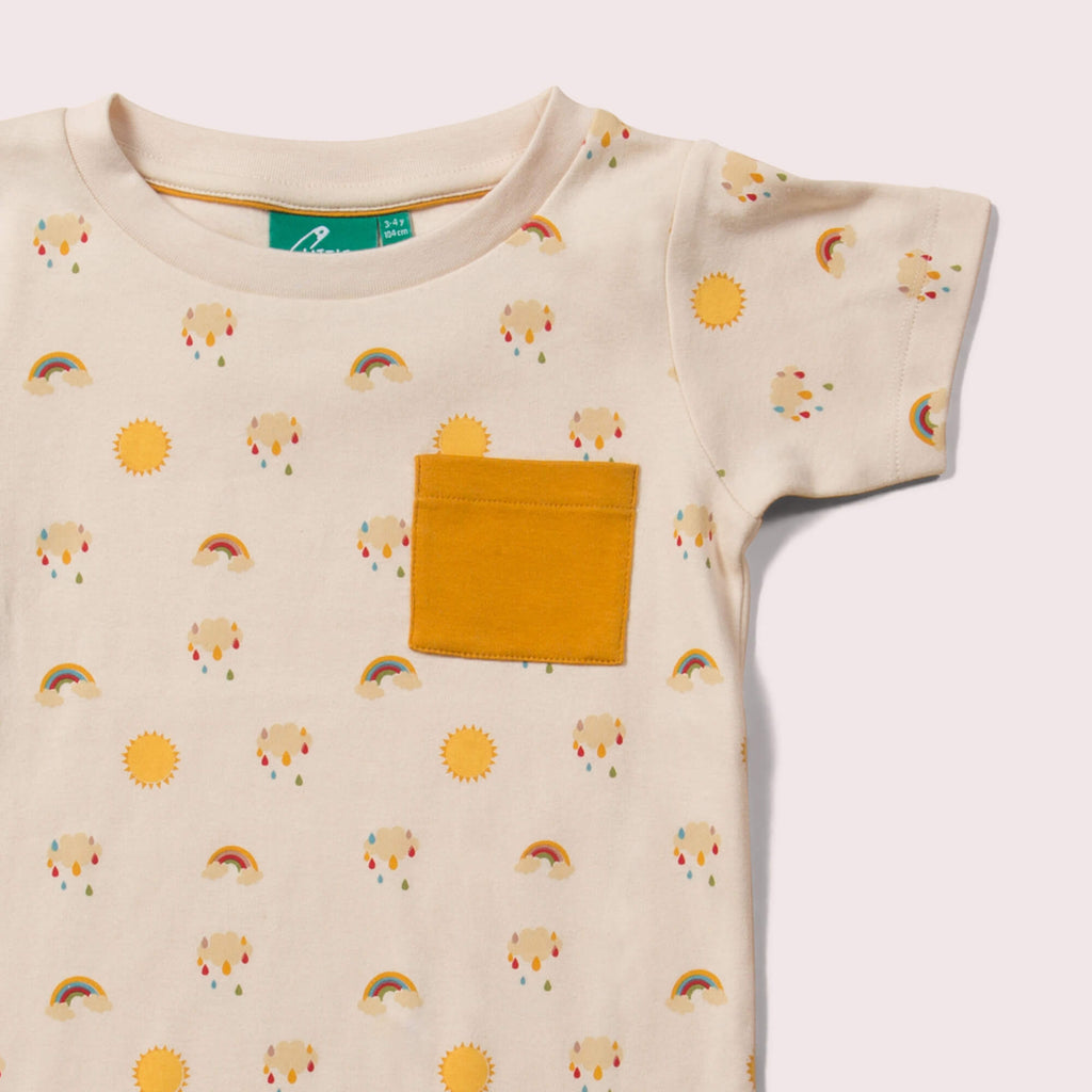 Little-Green-Radicals-Cream-T-Shirt-And-Jogger-Playset-With-Sunshine-And-Rainbow-Print-Closeup-View