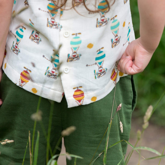 Little-Green-Radicals-Cream_Blue-And-RedSleeveless-Blouse-With-Hot-Air-Balloon-Print-Kid-Closeup