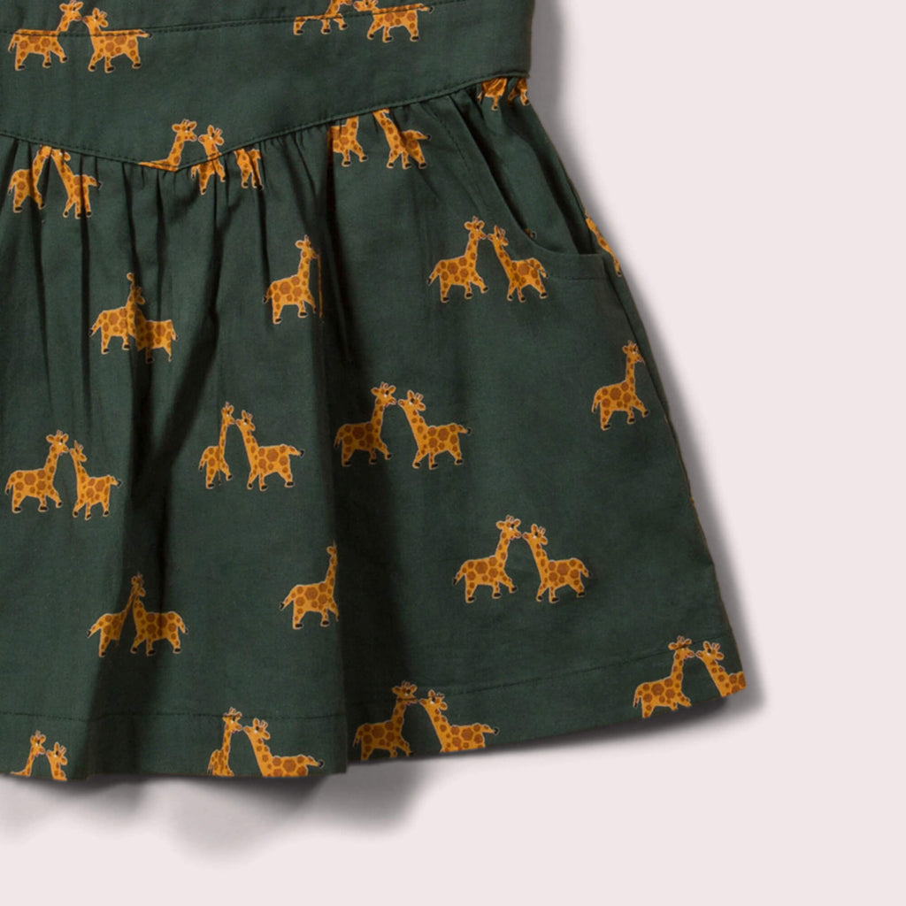 Little-Green-Radicals-Green-And-Yellow-Pinafore-Dress-With-Giraffe-Print-Closeup-View