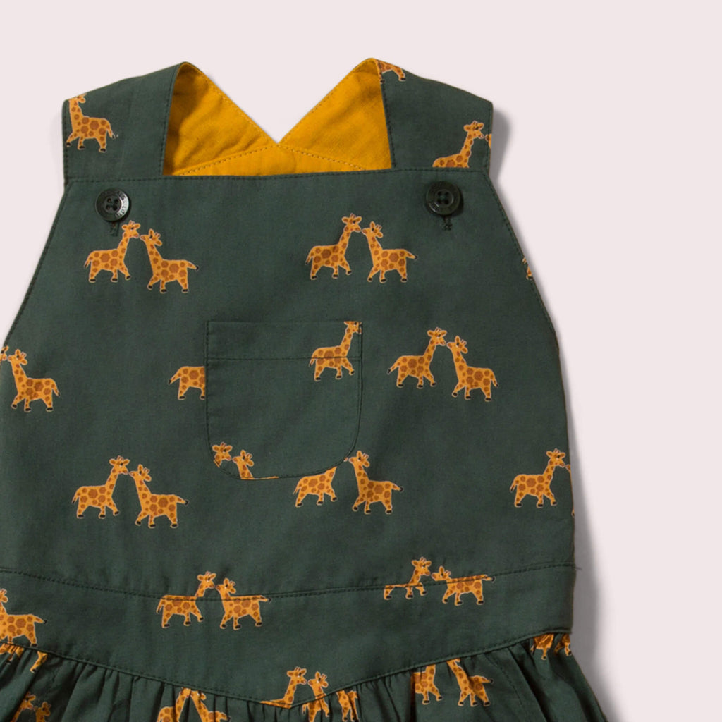 Little-Green-Radicals-Green-And-Yellow-Pinafore-Dress-With-Giraffe-Print-Closeup