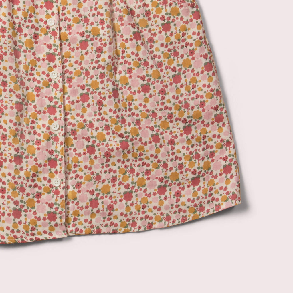 Little-Green-Radicals-Pink-Organic-Button-Dress-With-Ladybird-Print-Closeup-View