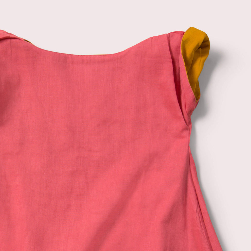Little-Green-Radicals-Yellow-And-Pink-Reversible-Dress-Closeup