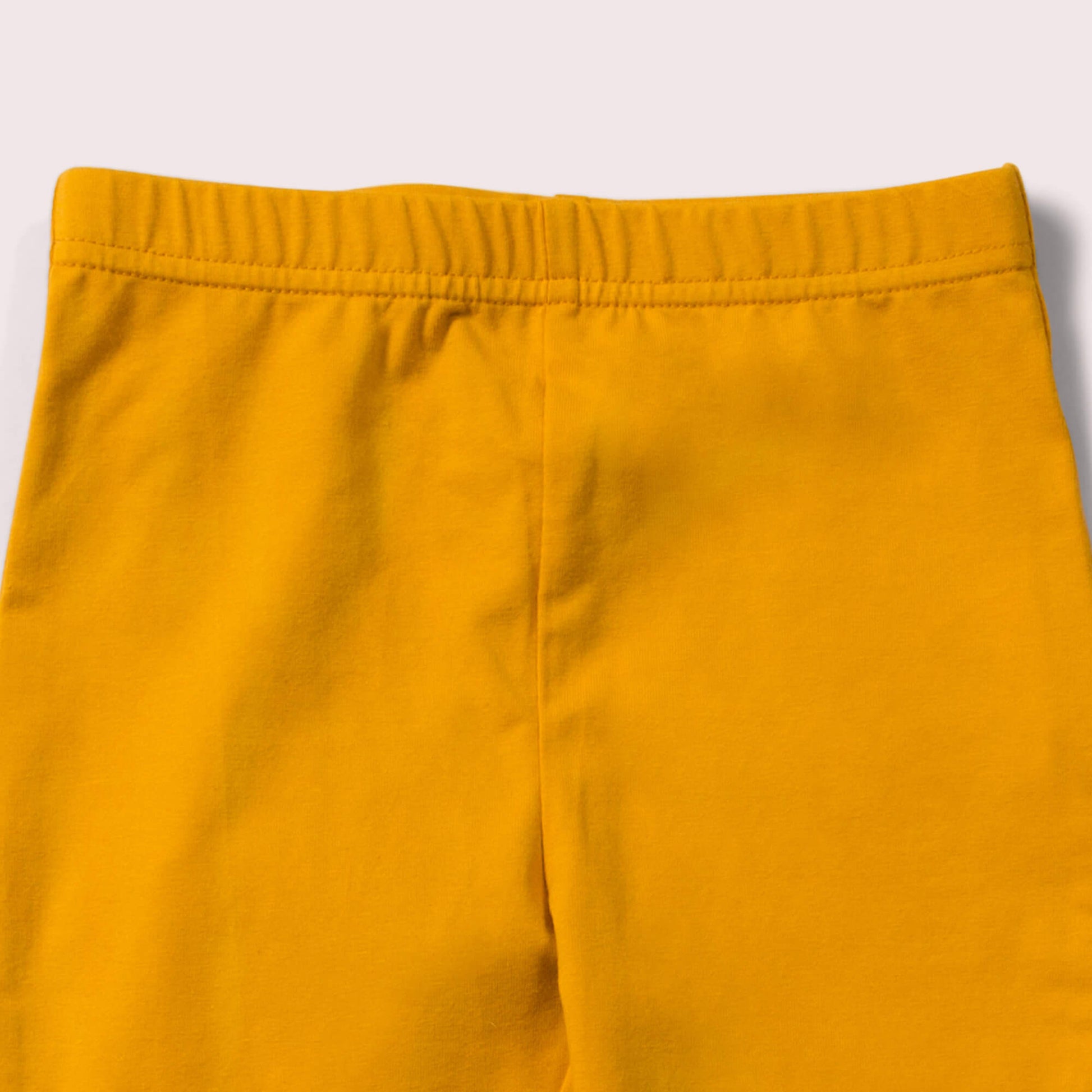 Little-Green-Radicals-Yellow-Leggings-Closeup-View