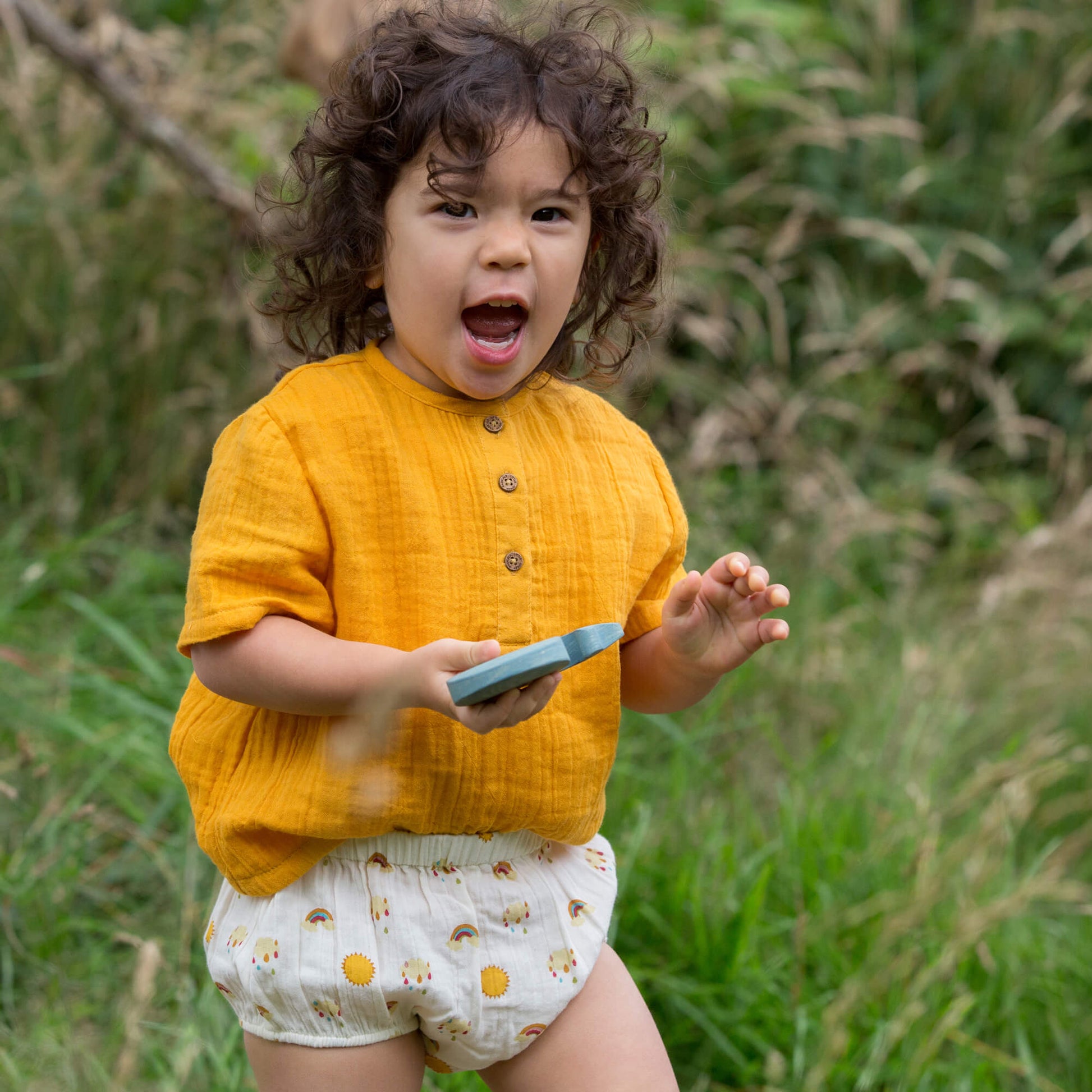 Little-Green-Radicals-Yellow-Organic-Muslin-Bloomer-Set-2-Pack-With-Sunshine-And-Rainbow-Print-Kid