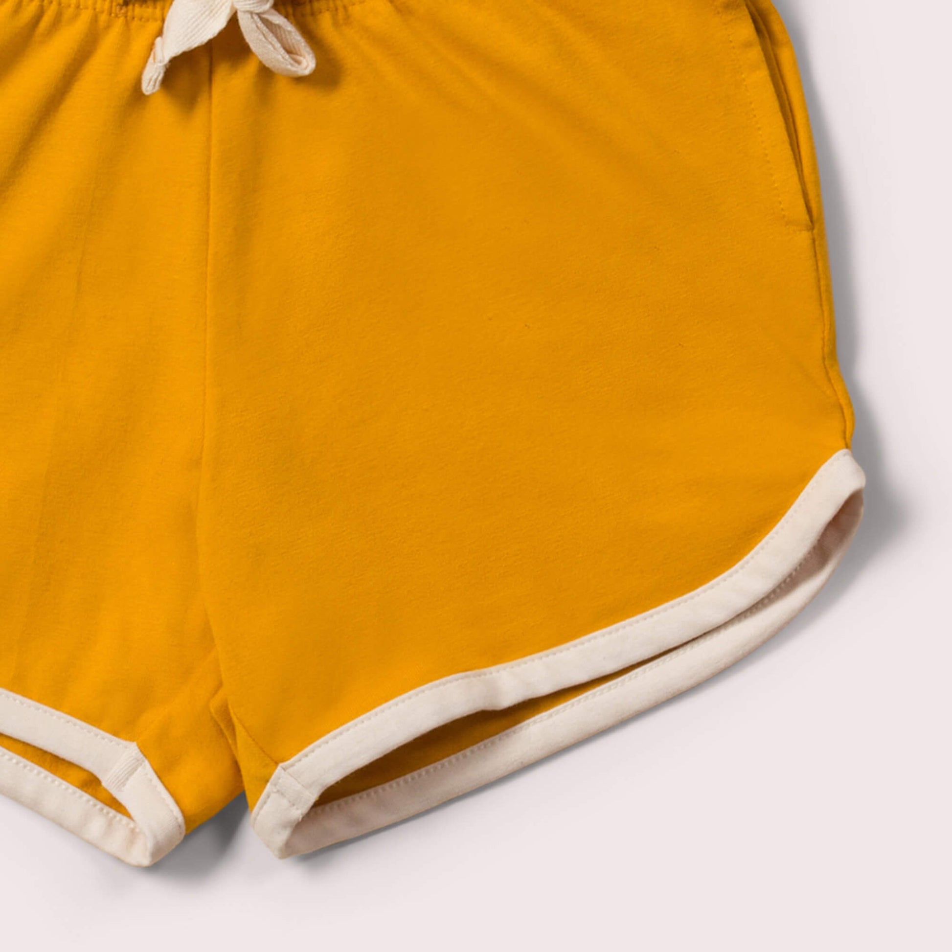 Little-Green-Radicals-Yellow-Run-Around-Shorts-Closeup-View