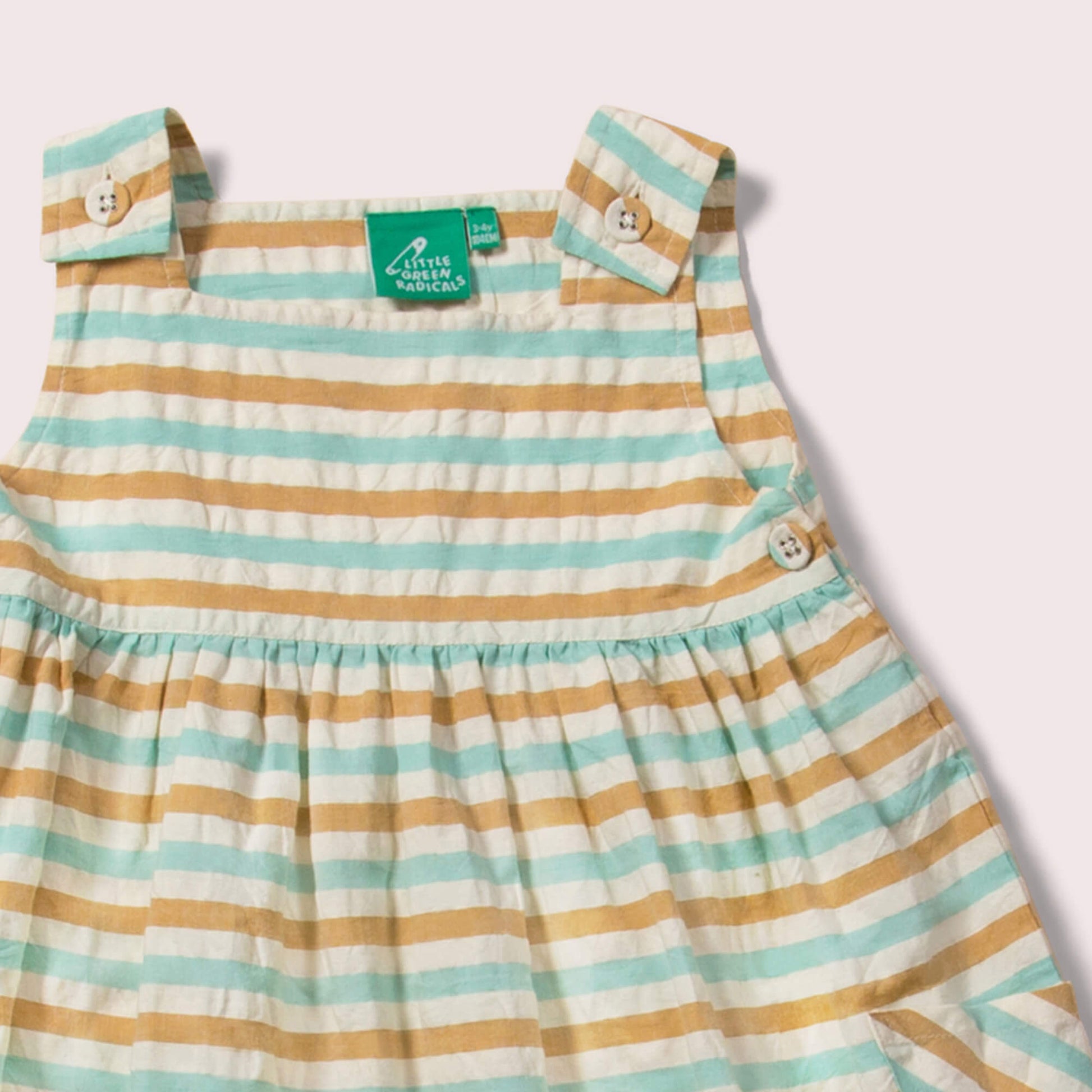 Little-Green-Radicals_Blue-And-Orange-Striped-Pinny-Dress-Closeup