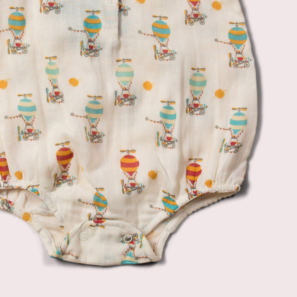 Little-Green-Radicals_Blue-Cream-and_Orange-Organic-Sleeveless-Baby-Bubble-Body-With-Hot-Air-Balloon-Print-Closeup-View