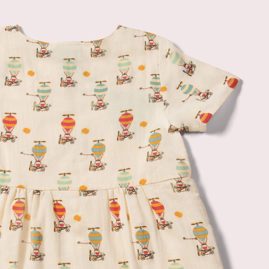 Little-Green-Radicals_Cream-Organic-Button-Dress-With-Hot-Air-Balloon-Print-Closeup