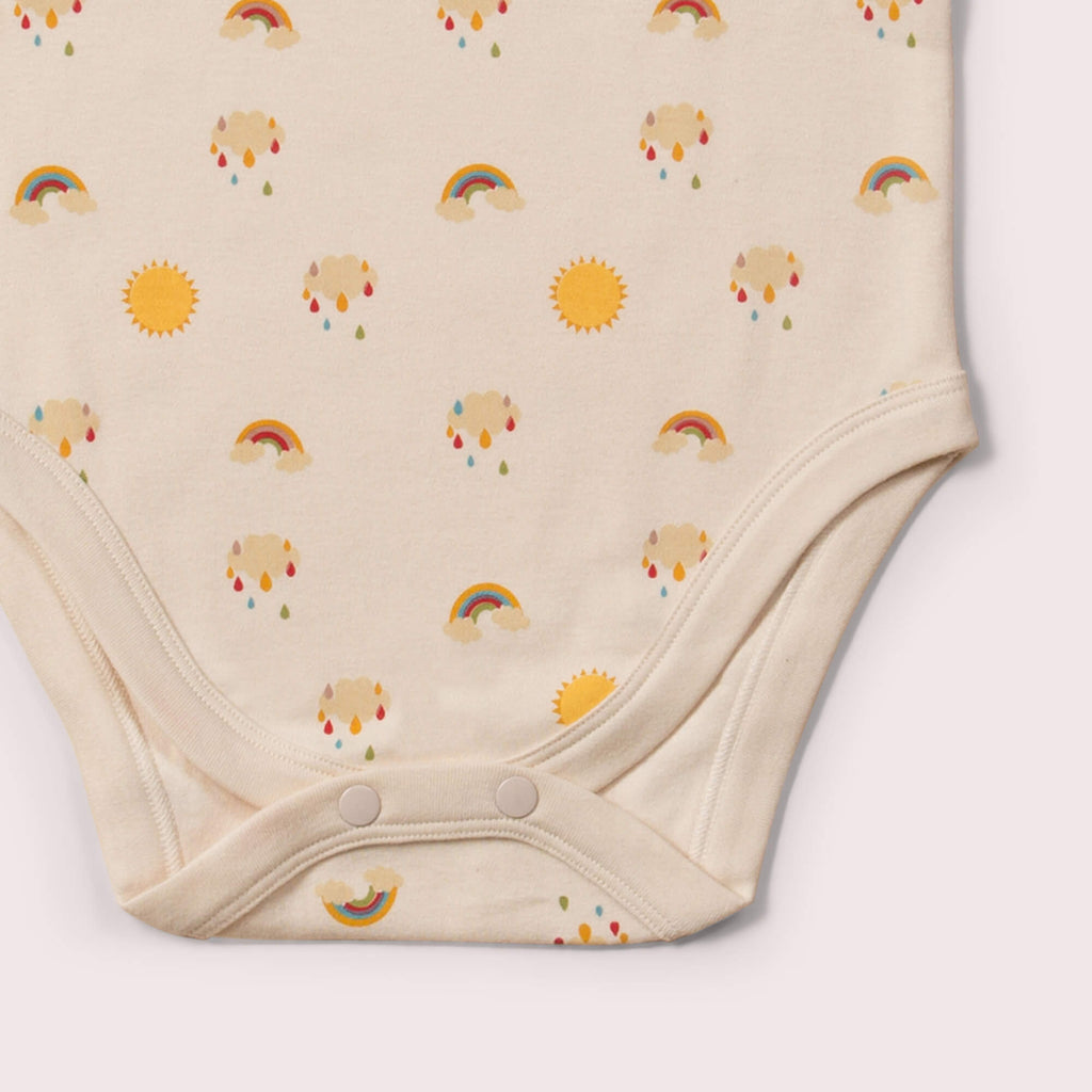 Little-Green-Radicals_Cream-and_Yellow-Striped-Baby-Bodies-Set-Two-Pack-With-Sunshine-and-Rainbow-Print-Closeup-View