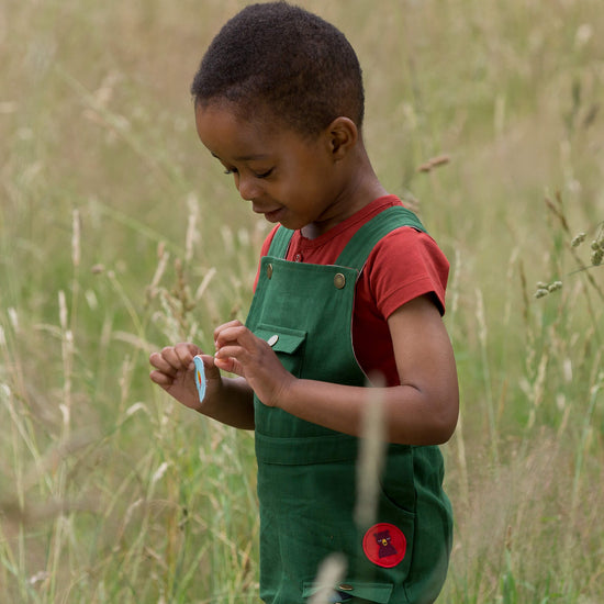 Little-Green-Radicals_Green-Shortie-Dungarees-Kid-Side-View