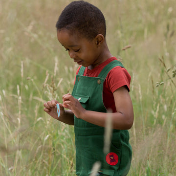 Little-Green-Radicals_Green-Shortie-Dungarees-Kid-Side-View