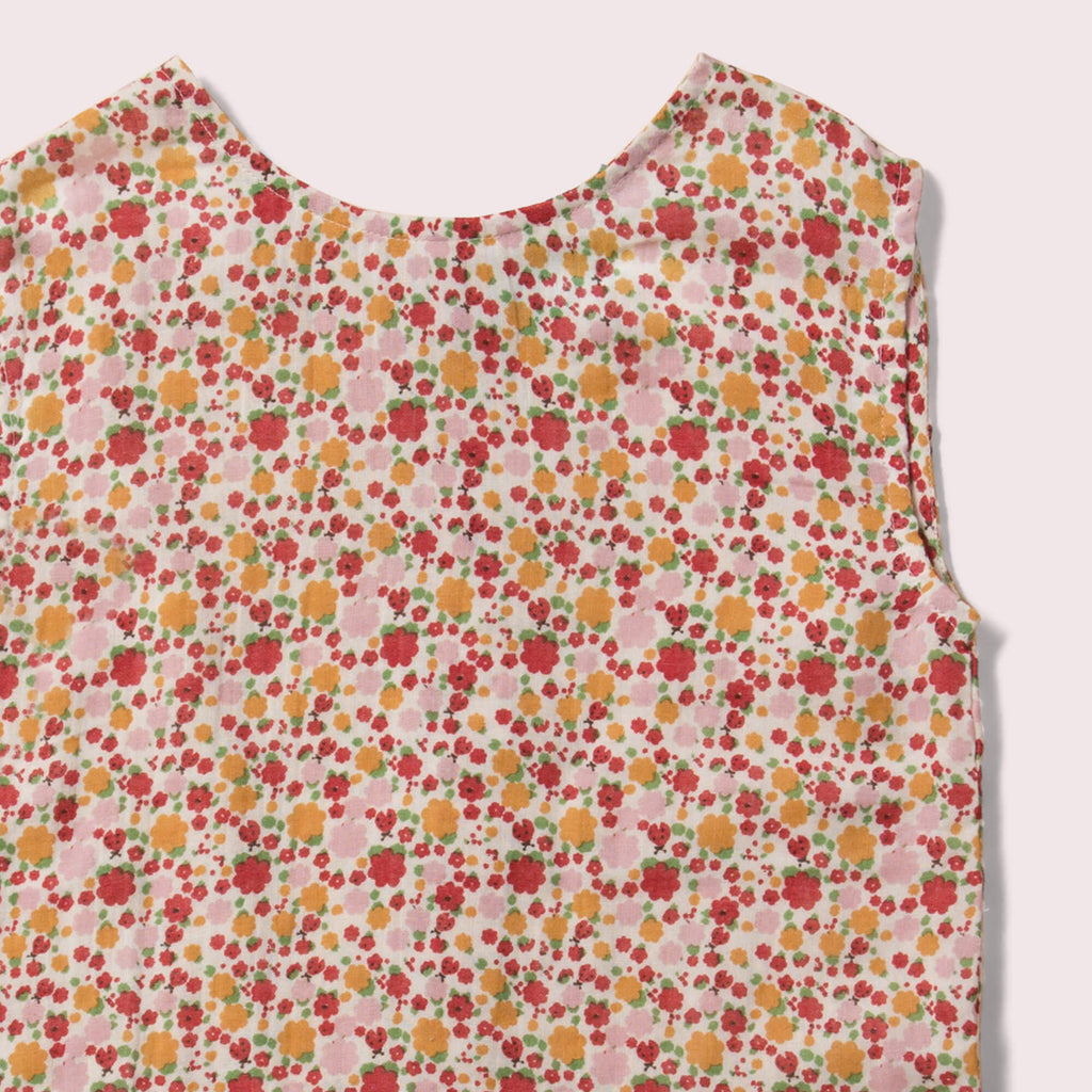 Little-Green-Radicals_Pink-And-Red-Sleeveless-Blouse-With-Ladybird-Print-Closeup