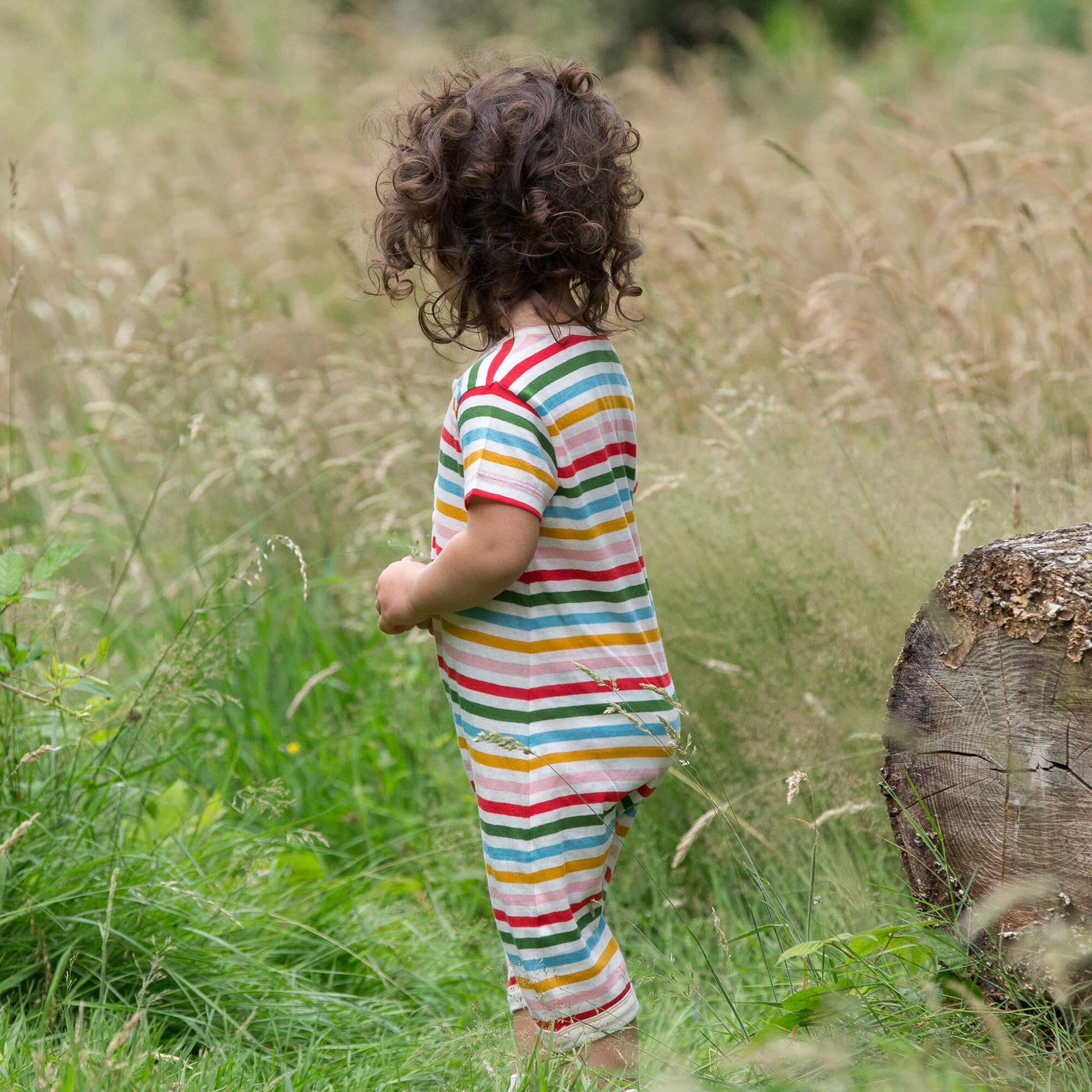 Little-Green-Radicals_Red-Green-Blue-Orange_Pink-and-Cream-Striped-Organic-Shortie-Romper-With-Rainbow-Print-Back-View