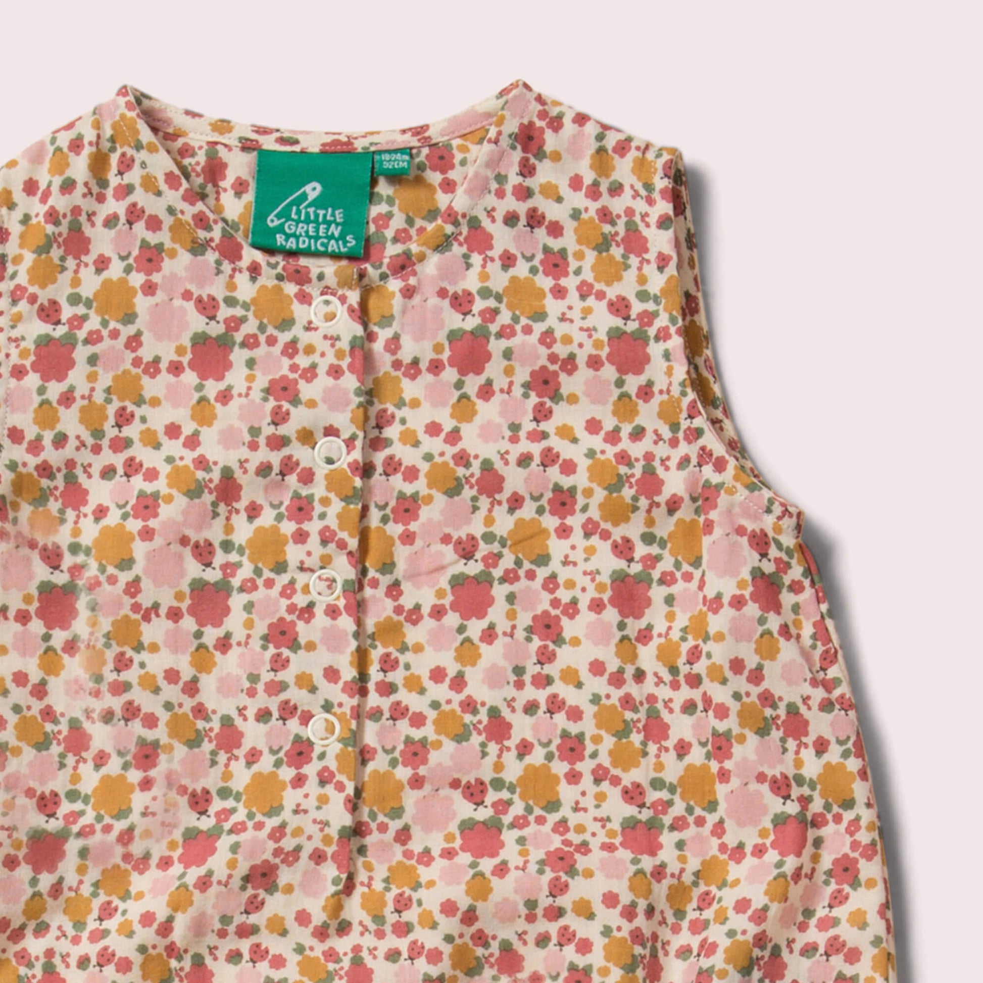Little-Green-Radicals_Red-and-Pink-Organic-Sleeveless-Baby-Bubble-Body-With-Ladybird-Print-Closeup